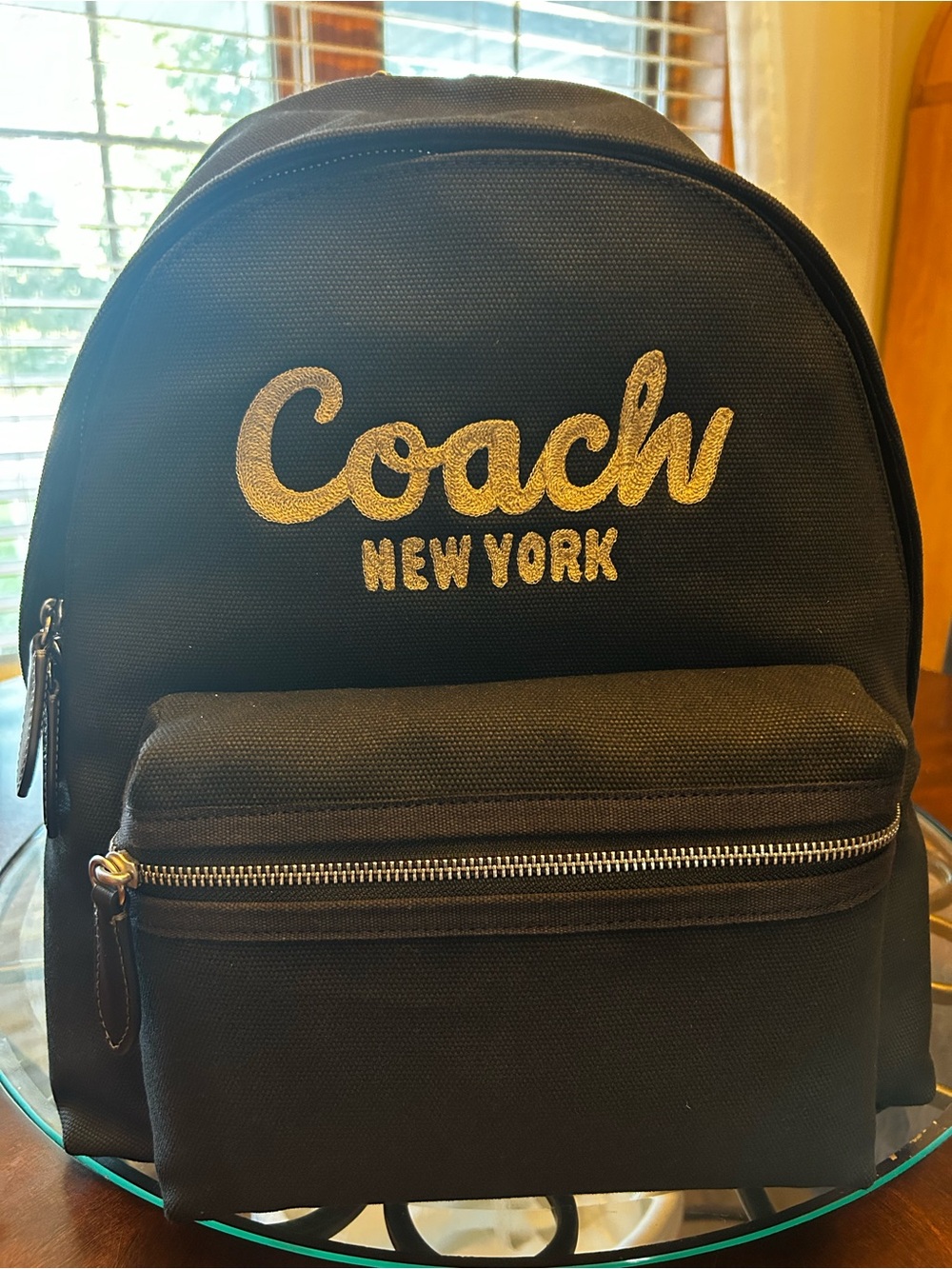 Coach Black Backpack with Gold Script Logo